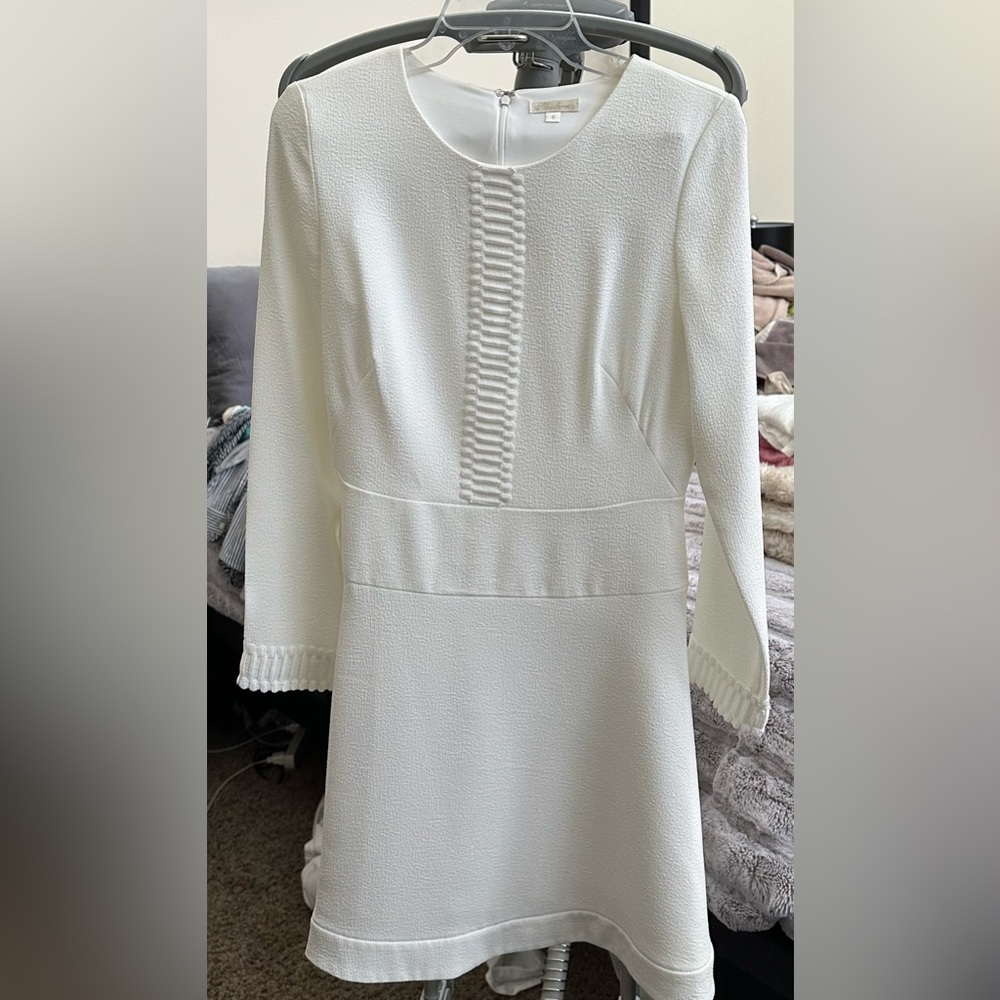 Beautiful Shoshanna long sleeve white dress. Perfect for a bridal shower.